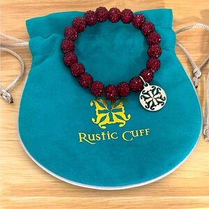 Red rustic cuff bracelet with silver charm